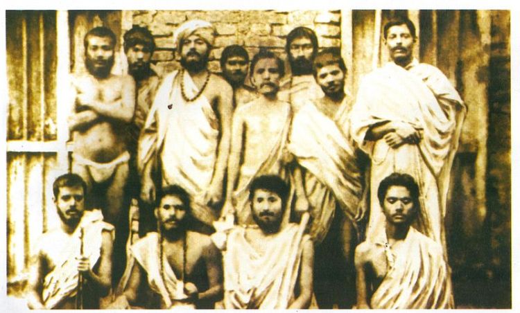 Group photo taken on 30 January 1887 In Baranagar Math, Kolkata.  Standing: (left–right) Shivananda,Ramakrishnananda, Vivekananda, Randhuni, Debendranath Majumdar,Mahendranath Gupta (ShriM),Trigunatitananda, H.Mustafi  Sitting(left2right) Niranjanananda, Saradananda, Hutko Gopal, Abhedananda